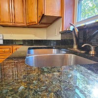 Closer view of the kitchen sink and pull out faucet at 4441 Sandy Lane rd. Columbus Ohio.