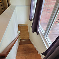 The main stairway leading to the basement inside 4441 Sandy Lane rd. Columbus Ohio.